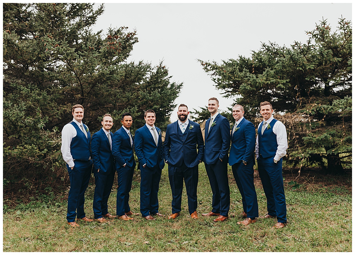 Groom and groomsmen wedding photography at Poplar Creek Barn in Oshkosh, Wisconsin