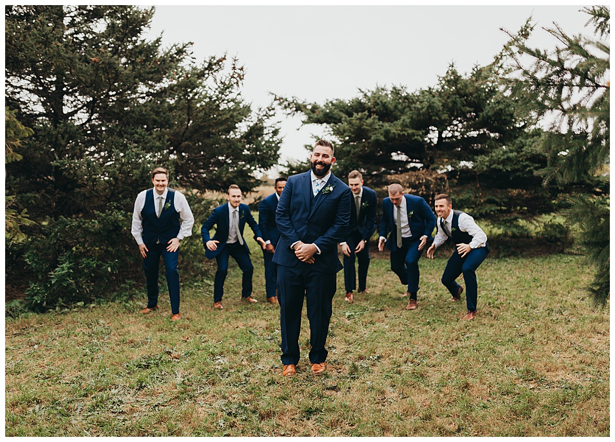 Groom and groomsmen wedding photography at Poplar Creek Barn in Oshkosh, Wisconsin